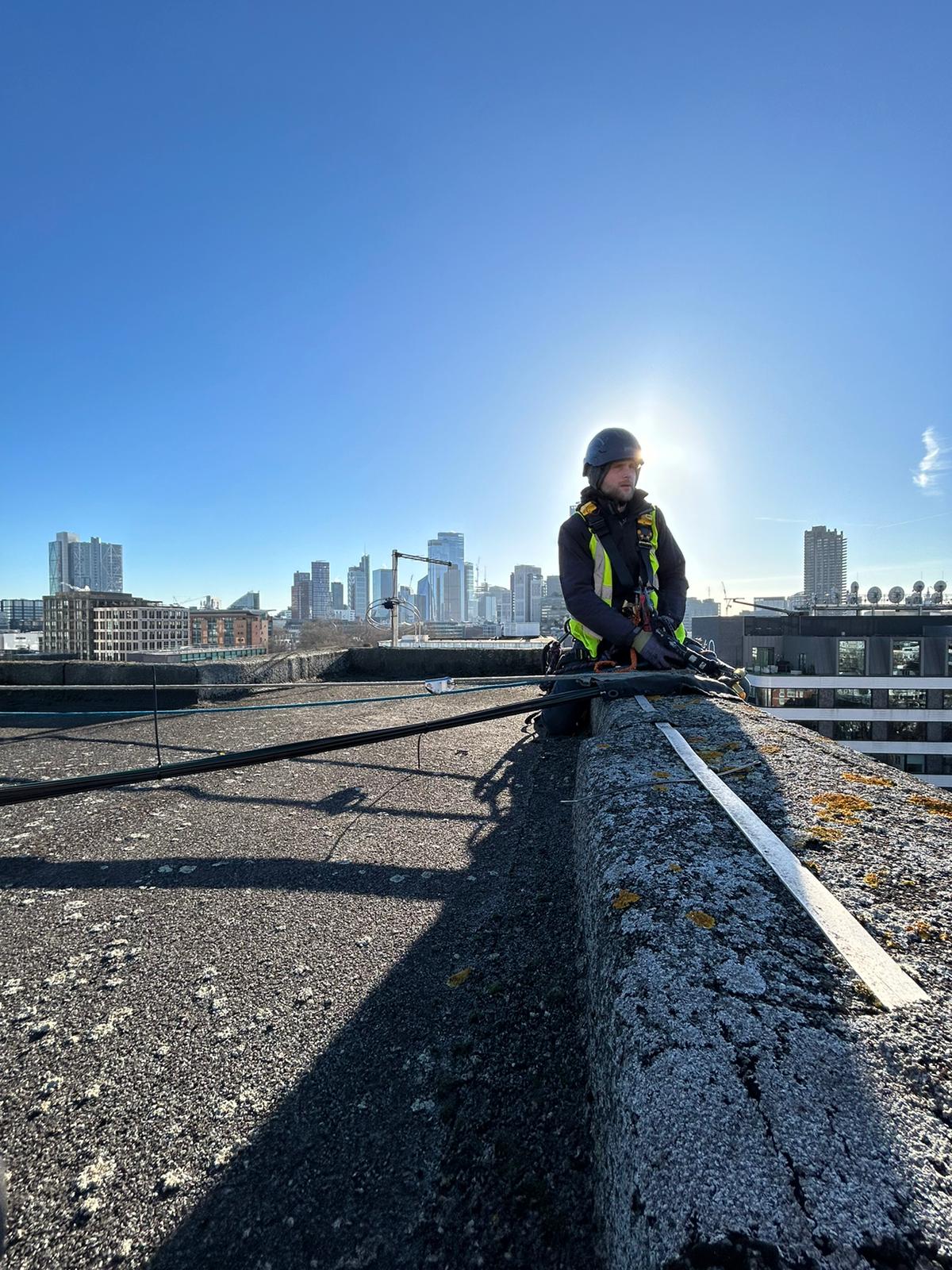 LMD Abseiling Ltd technician on rooftop in London